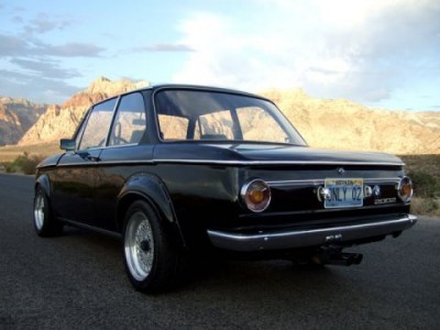 1973_BMW_2002_Flared_and_Restored_Black_Rear_1.jpg